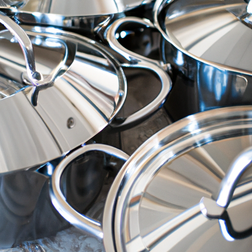 A selection of stainless steel cookware on a kitchen countertop.