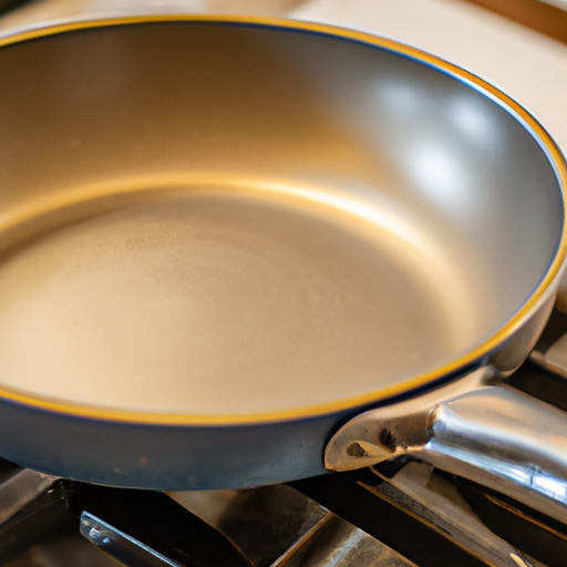 A close-up of a stainless steel frying pan on a stovetop.